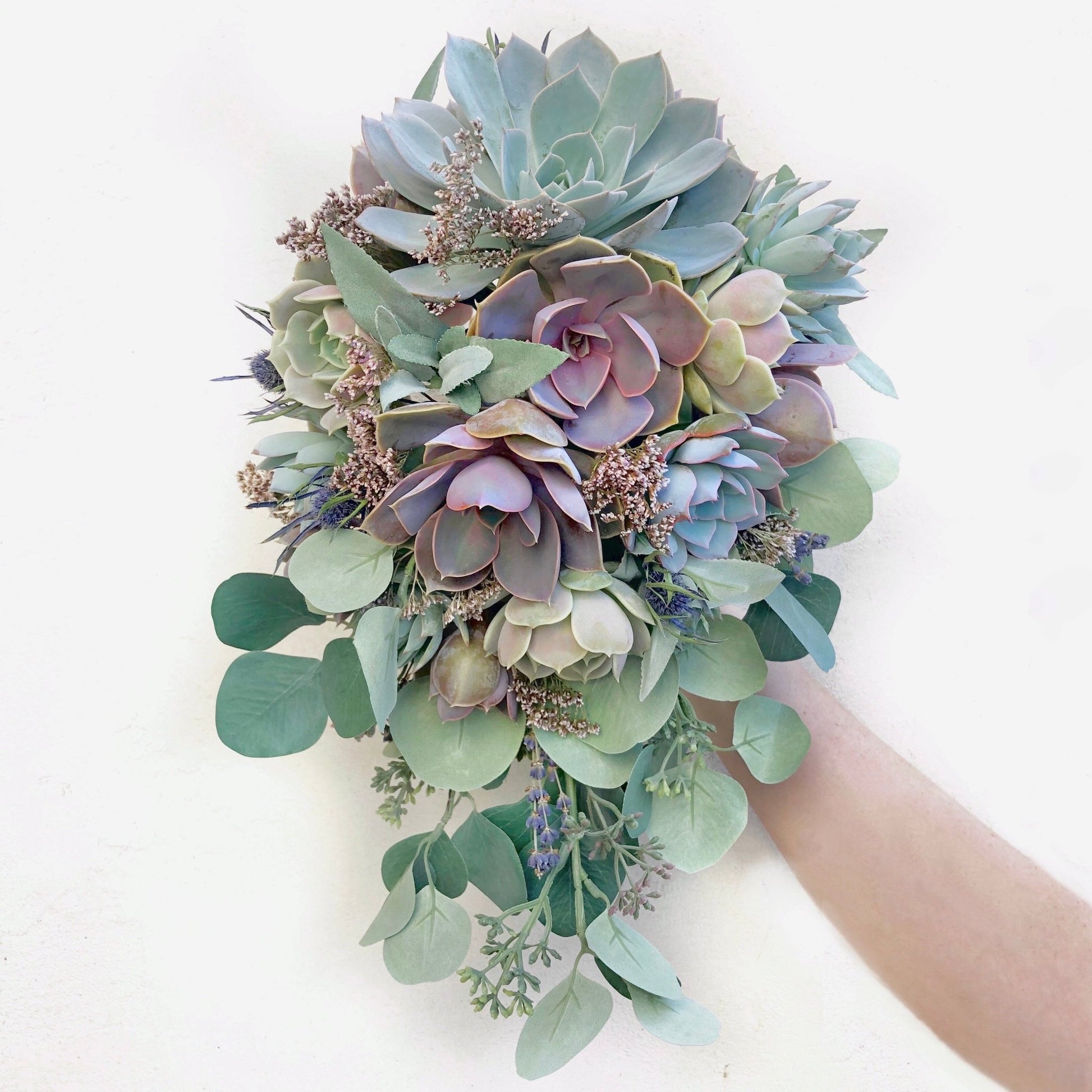 cascading succulent bouquet Cascading Wedding Bouquet